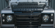 Load image into Gallery viewer, DA1968 - DEFENDER XS FRONT GRILLE AND HEADLAMP SURROUNDS IN BLACK WITH SILVER MESH
