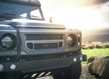 Load image into Gallery viewer, DEFENDER X-LANDER FRONT GRILLE &amp; HEADLIGHT SURROUNDS BY CHELSEA TRUCK CO.
