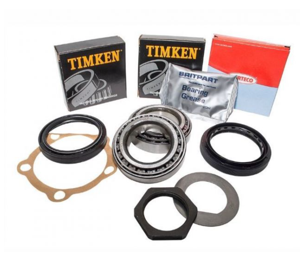OEM FRONT AND REAR WHEEL BEARING KIT FOR DISCOVERY 1 UP TO JA CHASSIS NUMBER - TIMKEN WHEEL BEARINGS, FLANGE GASKET, CORTECO HUB SEALS, HUB CAP AND LOCK TABS